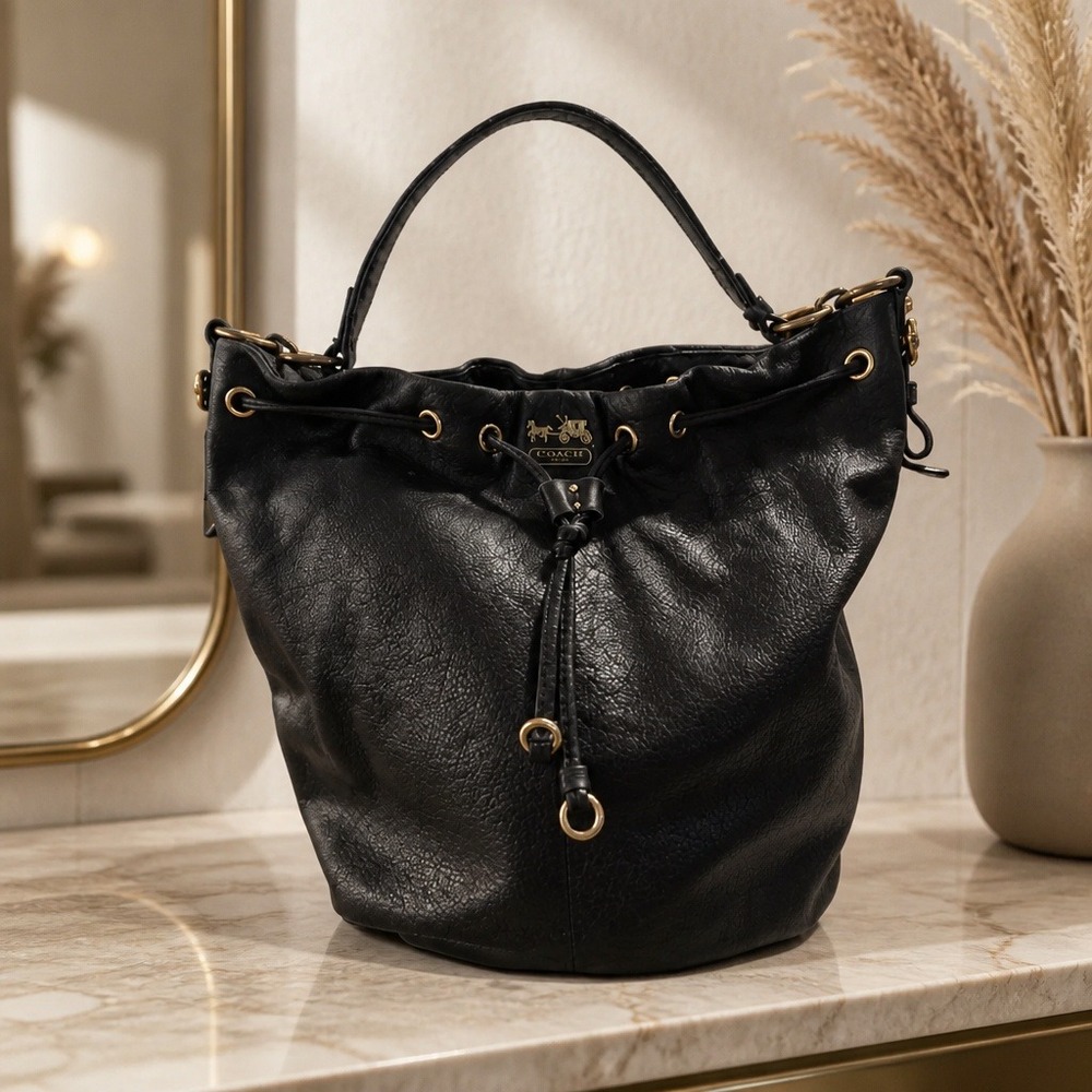 Coach Black Pebbled Leather Drawstring Bucket Bag Purple Lining‎ Brass Hardware